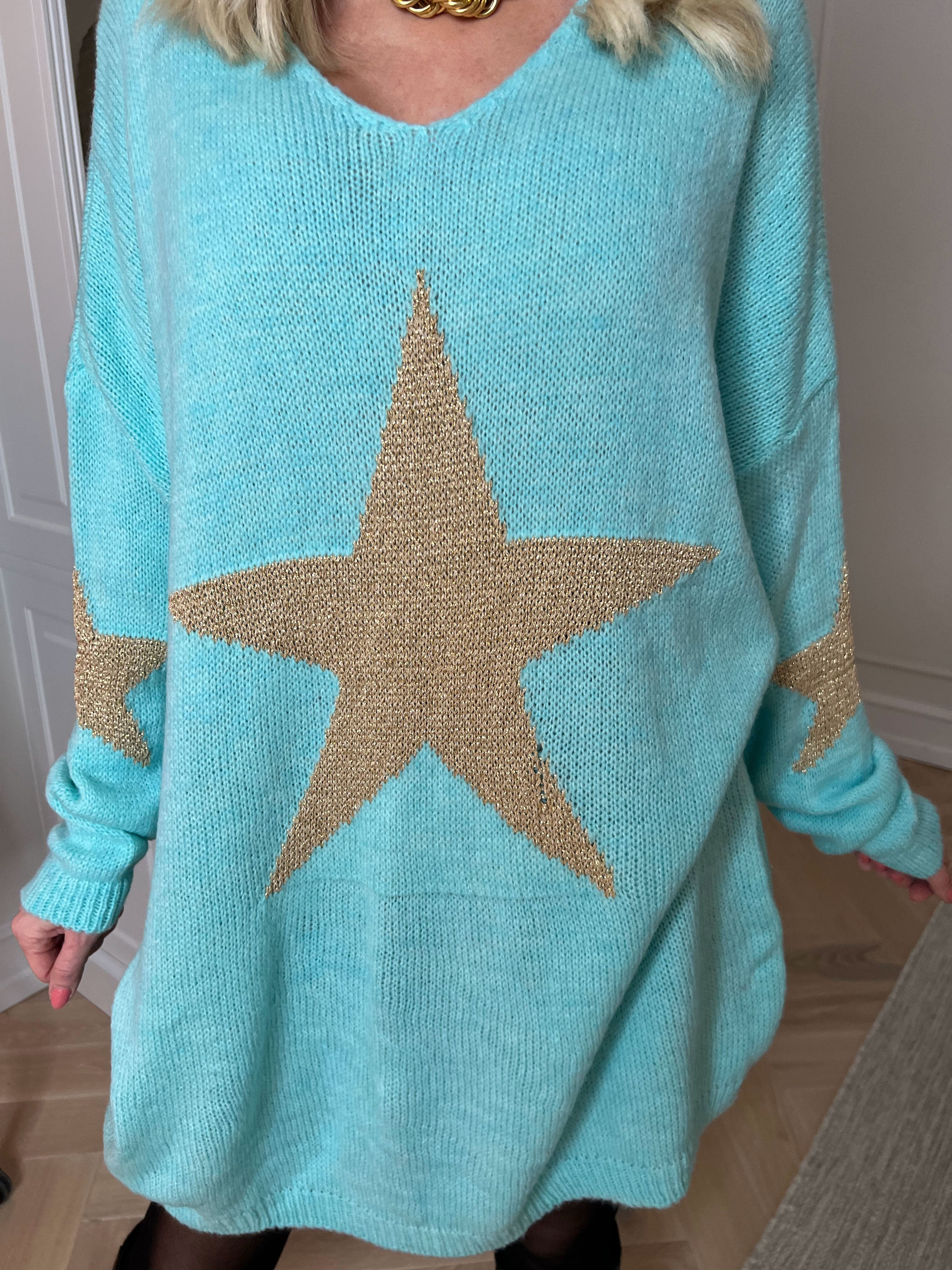 Nikola - Strikkjole med guldstjerner og v-udskæring